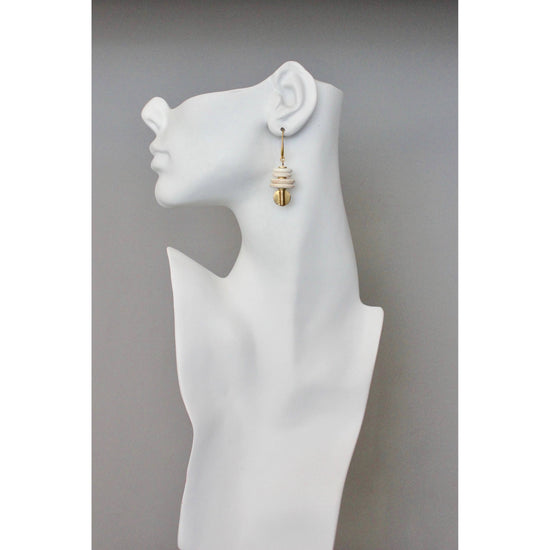 BKNE05 White magnesite and brass earrings